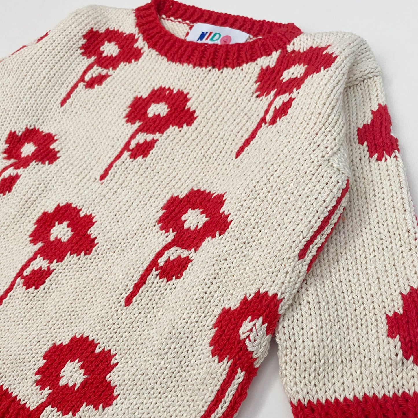 Red flower sweater